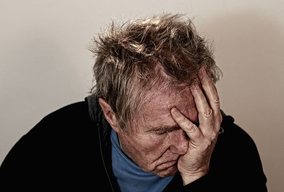 disappointedelderlyfacepalmheadache.jpg